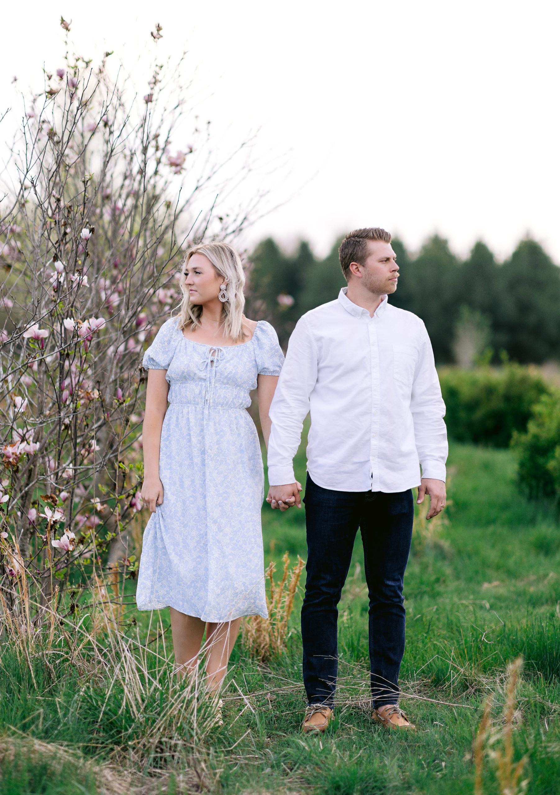 engagement couple looking opposite directions Tatyana Zadorin Photography