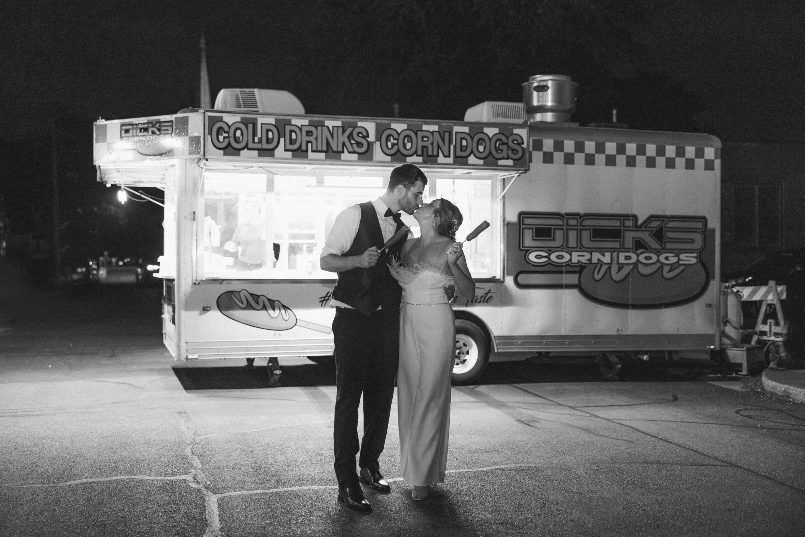 bride and groom portrait by the food truck