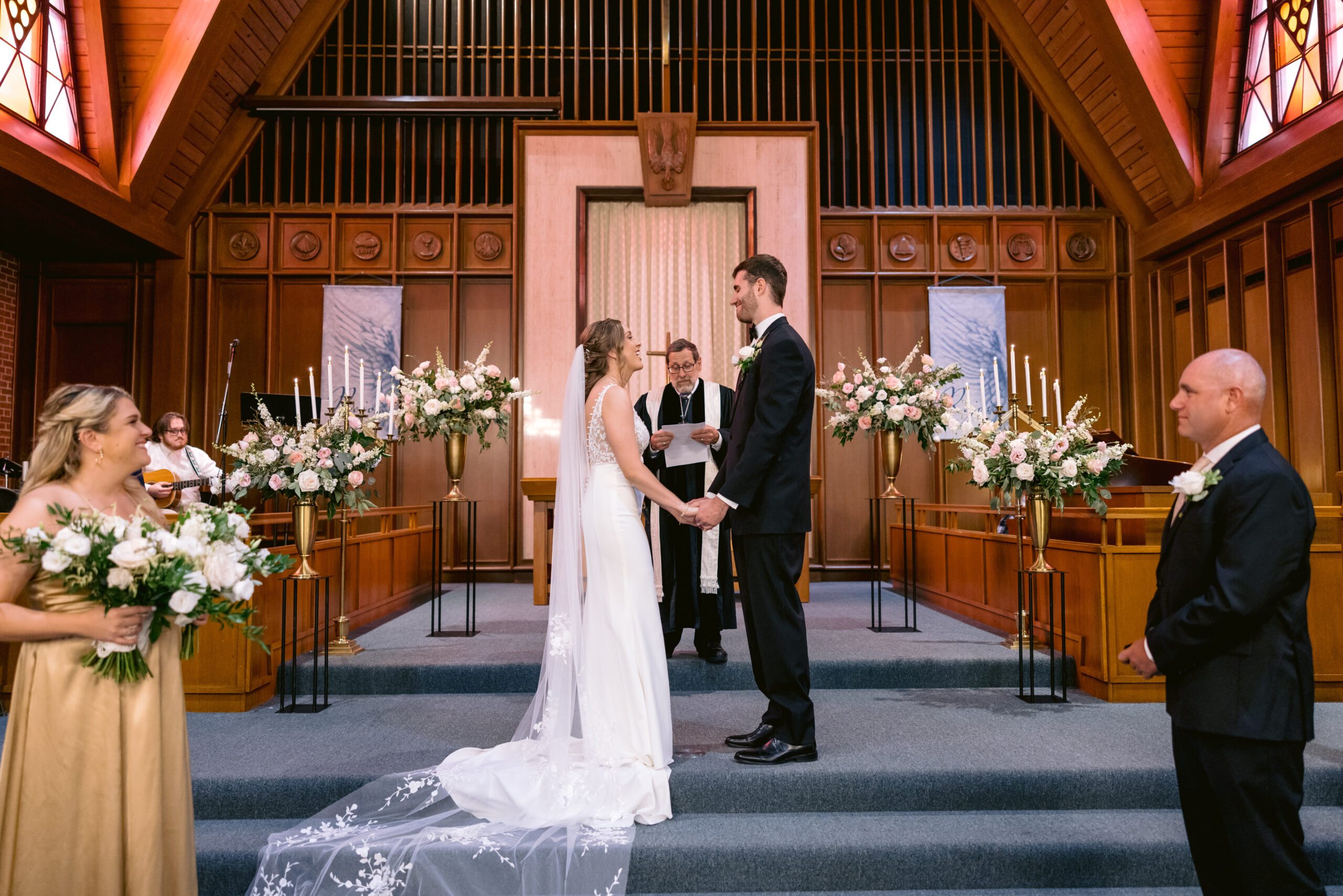 Bride and groom at the alter in the catholic church