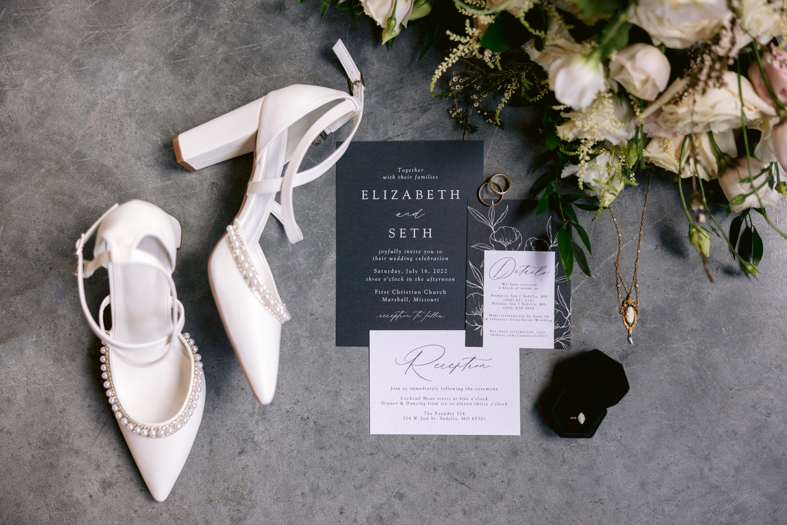 wedding invitation details at the foundry 324 venue. 