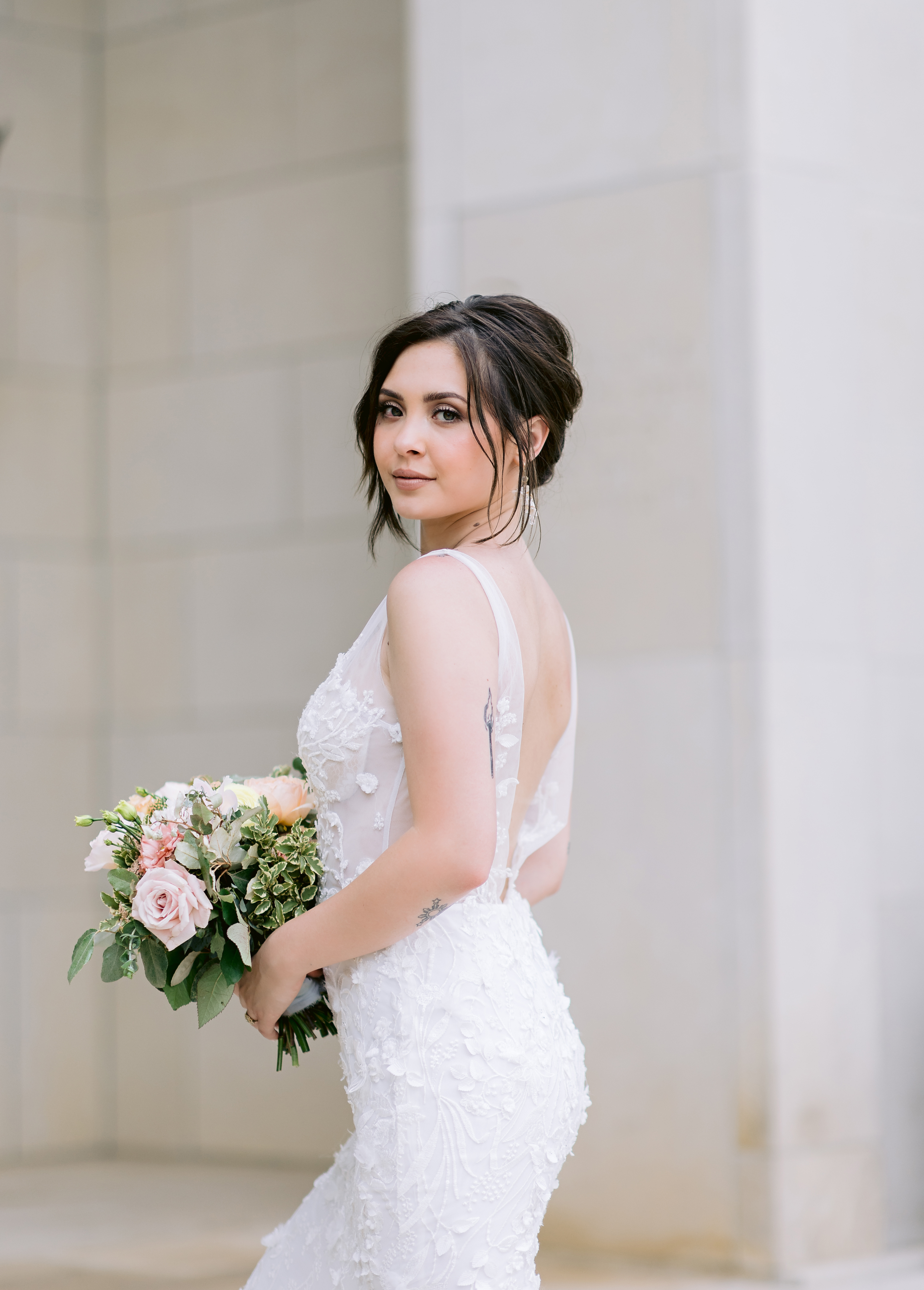 Close-up shot of bride looking elegantly at the camera, captured by Tatyana Zadorin