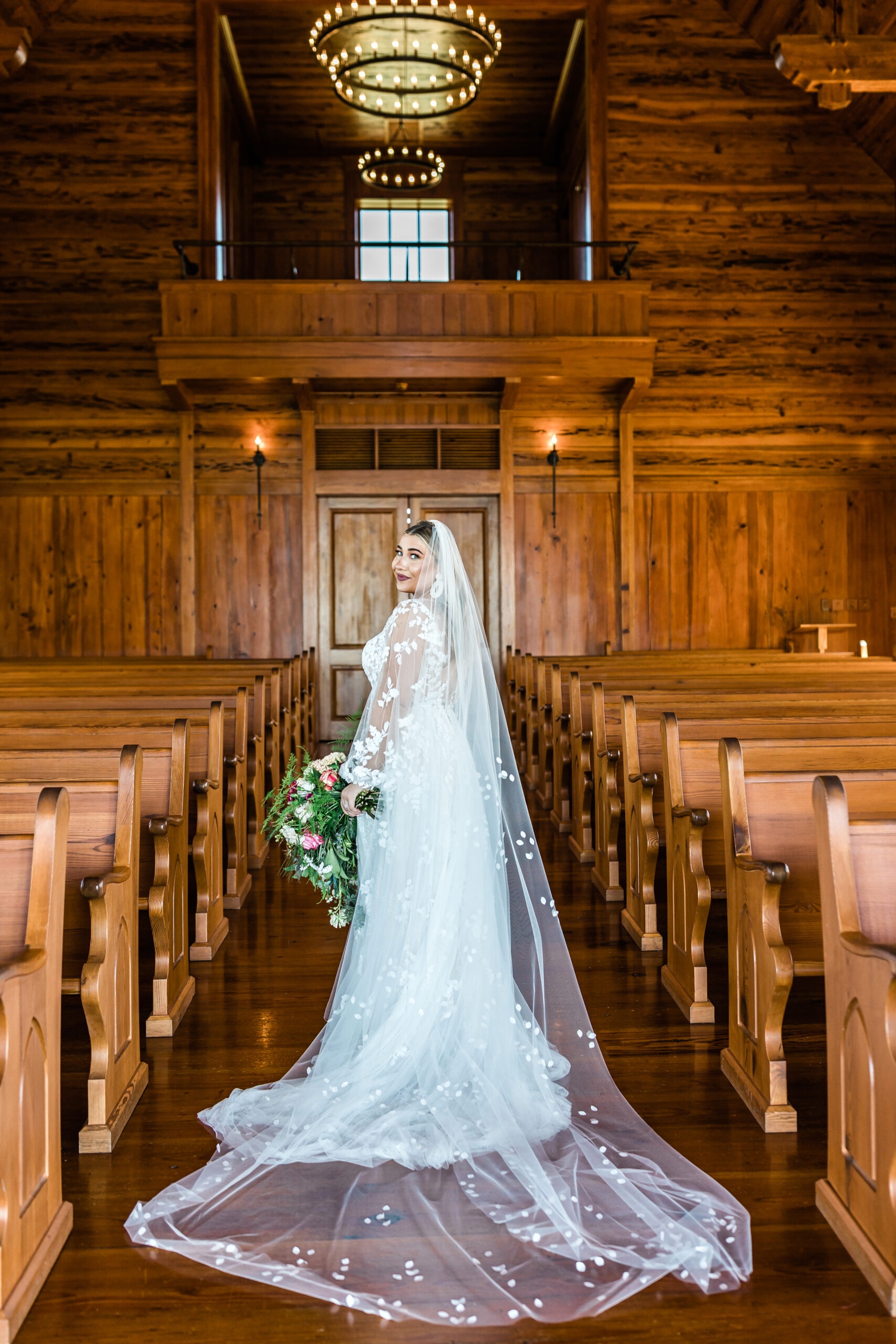 Single photography of Bride looking over her shoulder. Branson Missouri Wedding Photographer. 