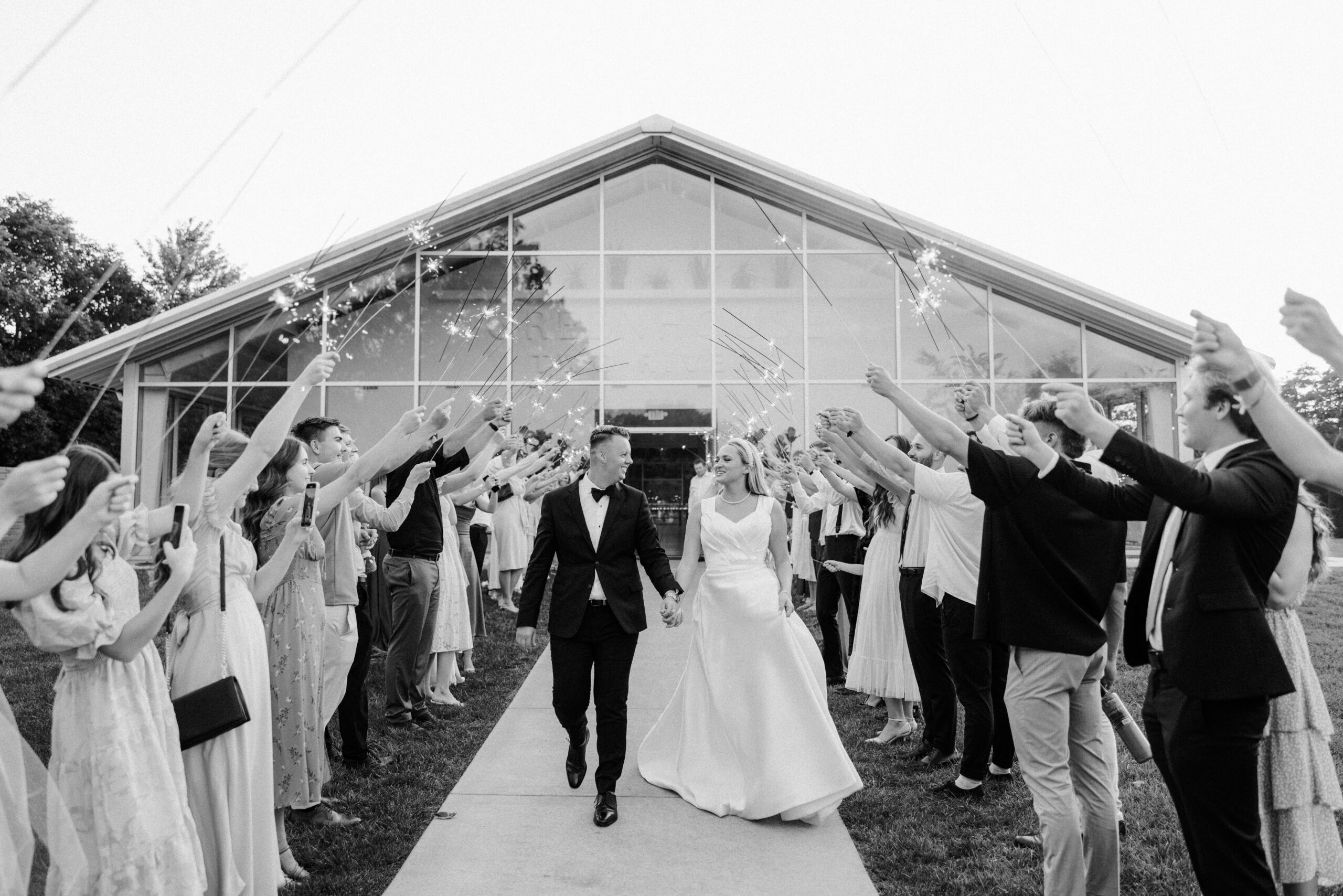 Bride and groom grand sparkler exit black and white photo photographed by Tatyana Zadorin Photography