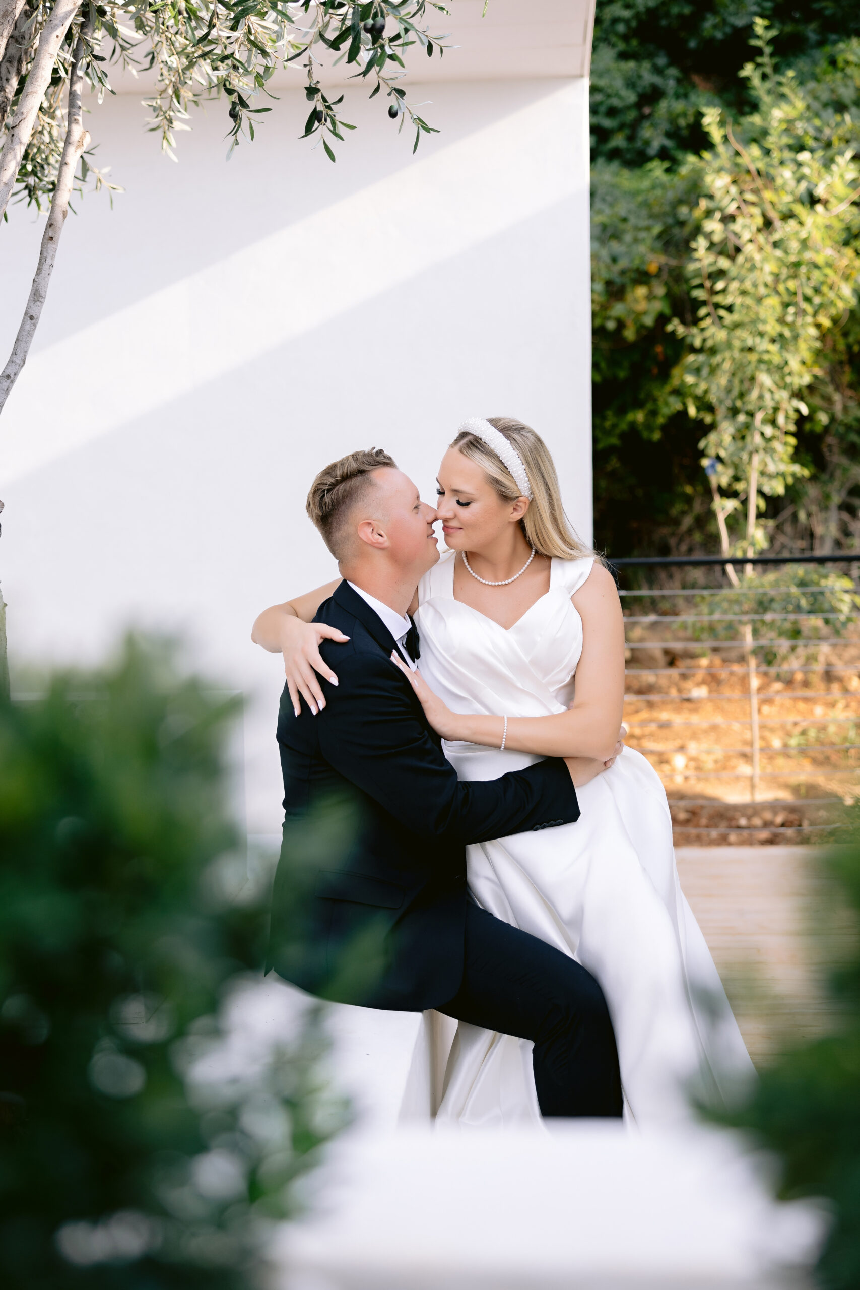 bride and groom about to kiss portrait at the Greenhouse Two rivers wedding. Midwest wedding photographer. Destination wedding photographer