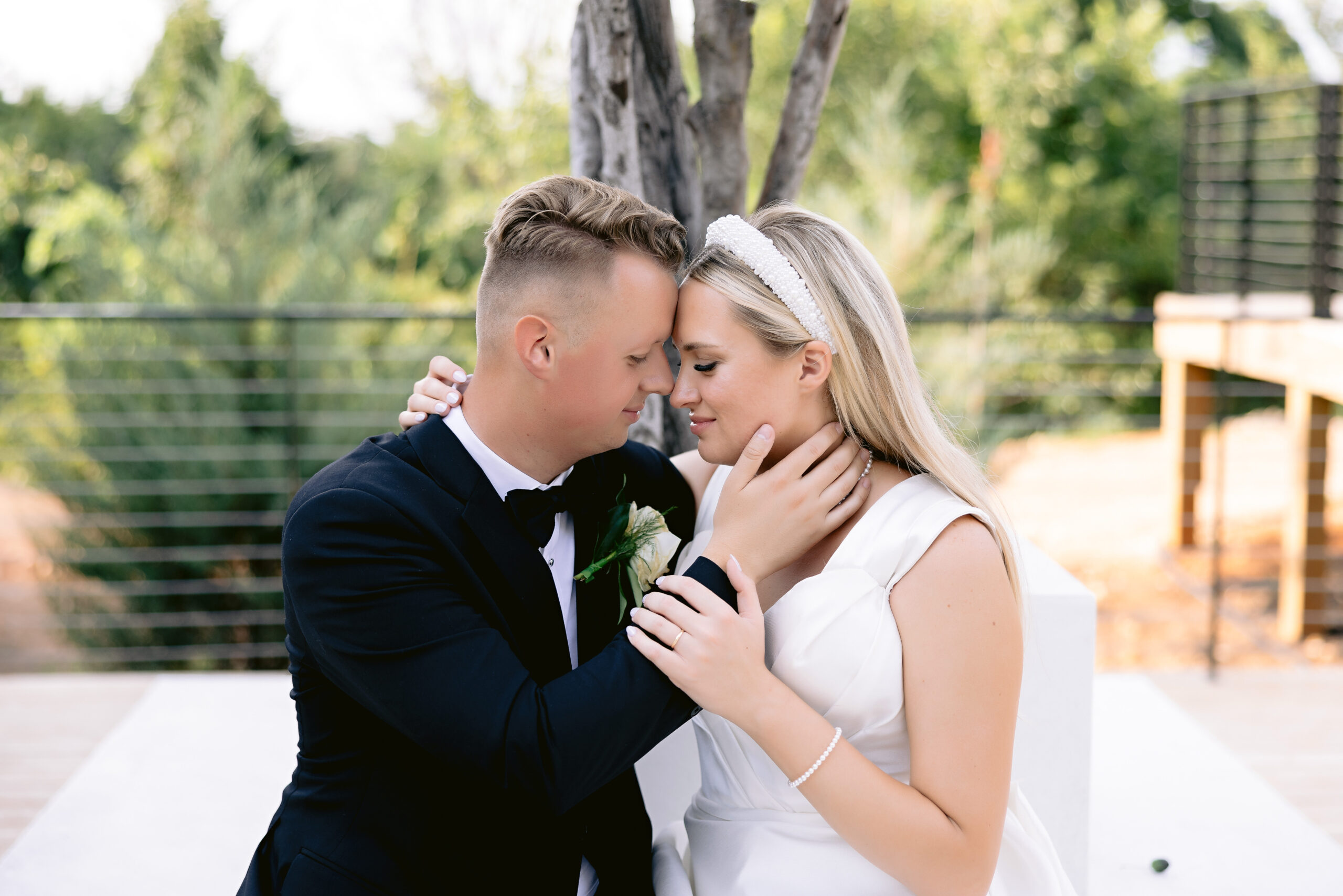 bride and groom forehead to forehead intimate closeup portrait photographed by Tatyana Zadorin Photography